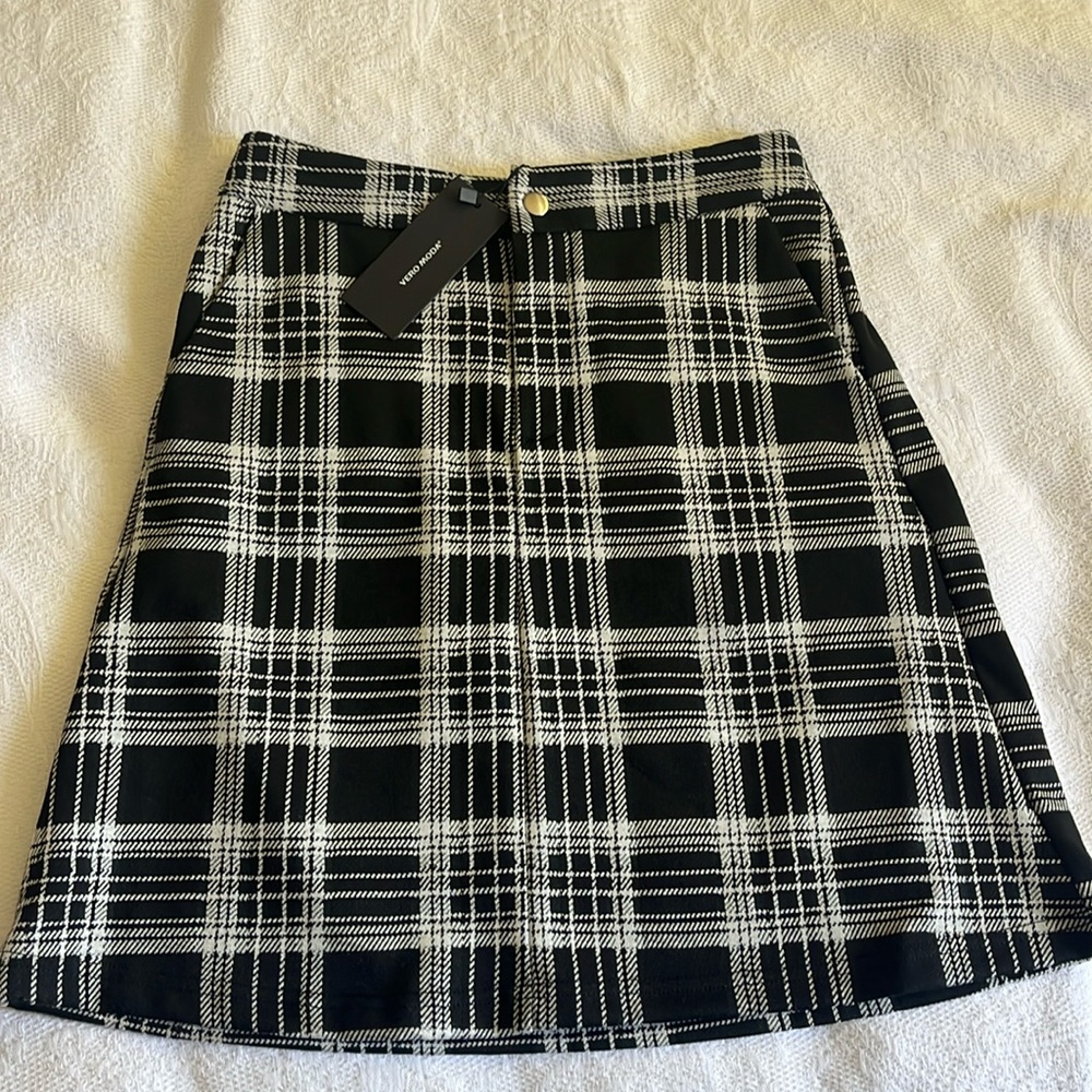 Black plaid skirt.